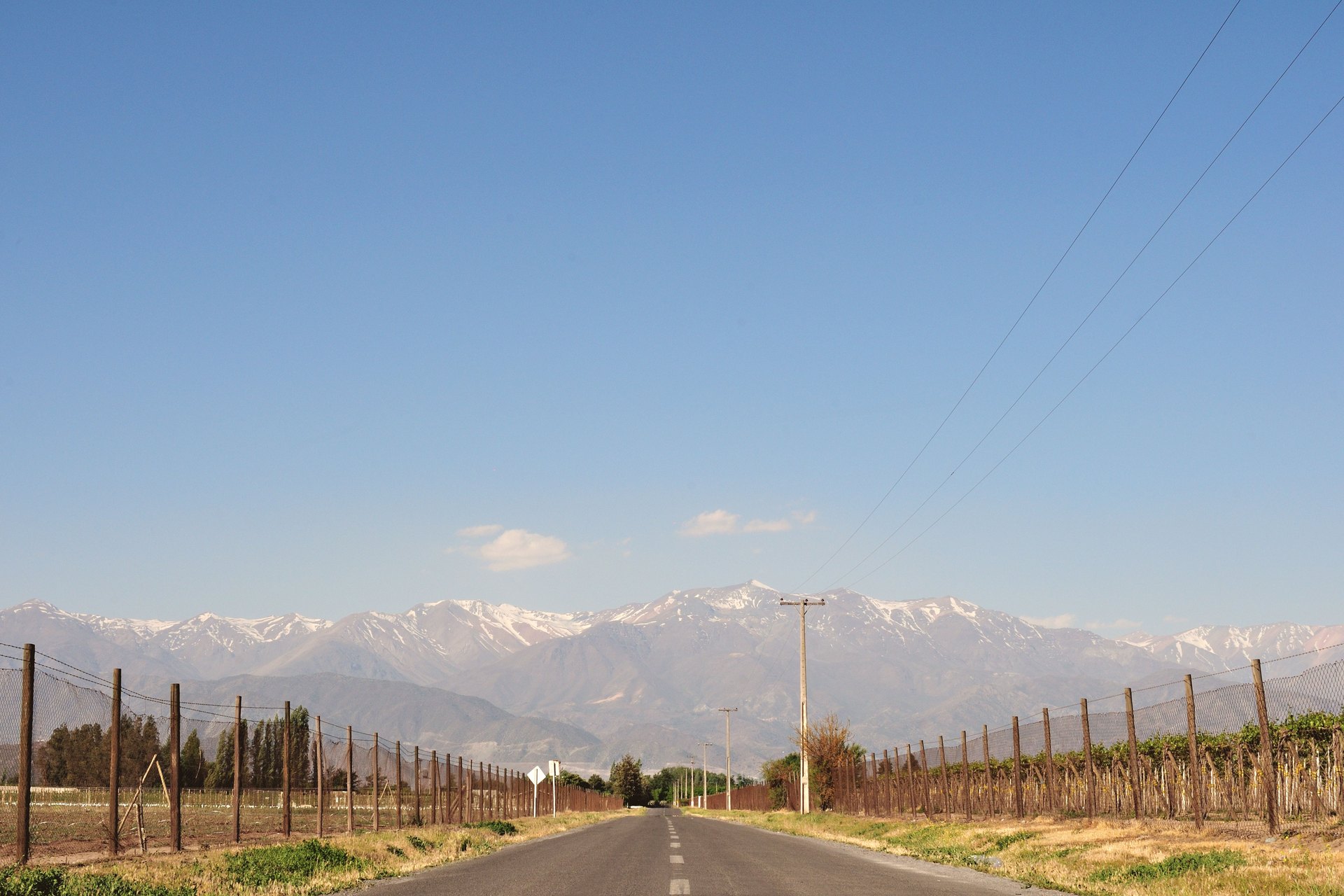 Rural road heading toward the Andes outside Santiago